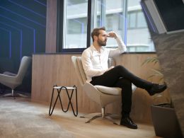 Person sitting on a chair thinking something