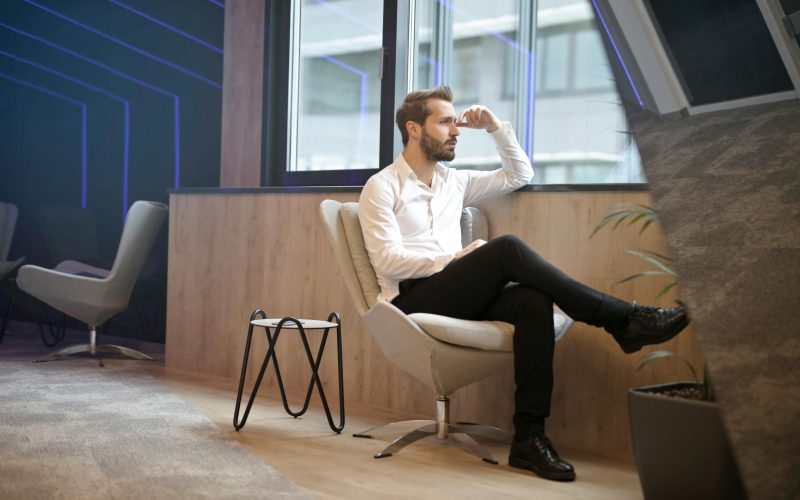 Person sitting on a chair thinking something